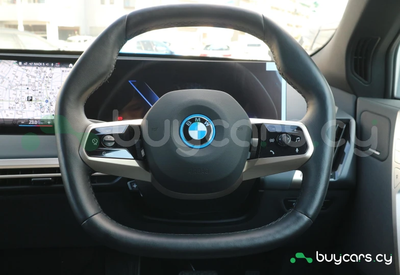 BMW iX Бирюзовый