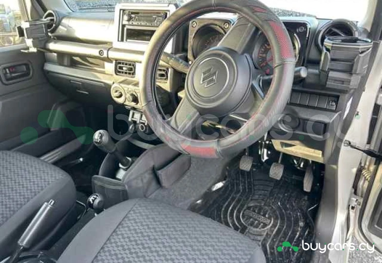 Suzuki Jimny Серый